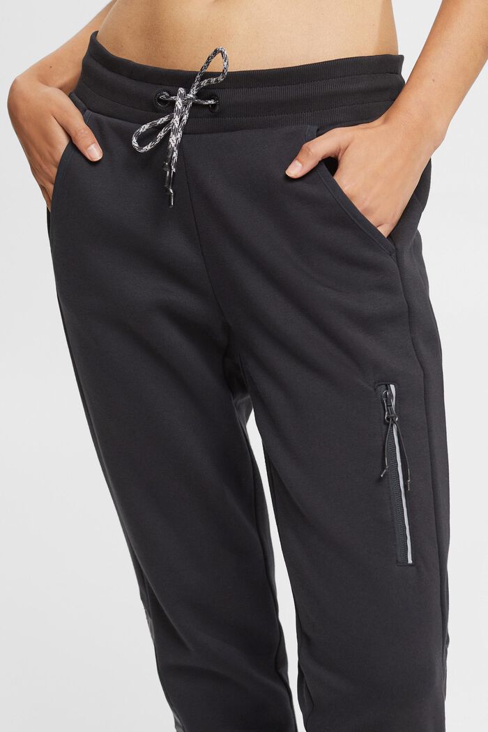 Pantaloni della tuta con tasca sulla gamba, BLACK, detail image number 0