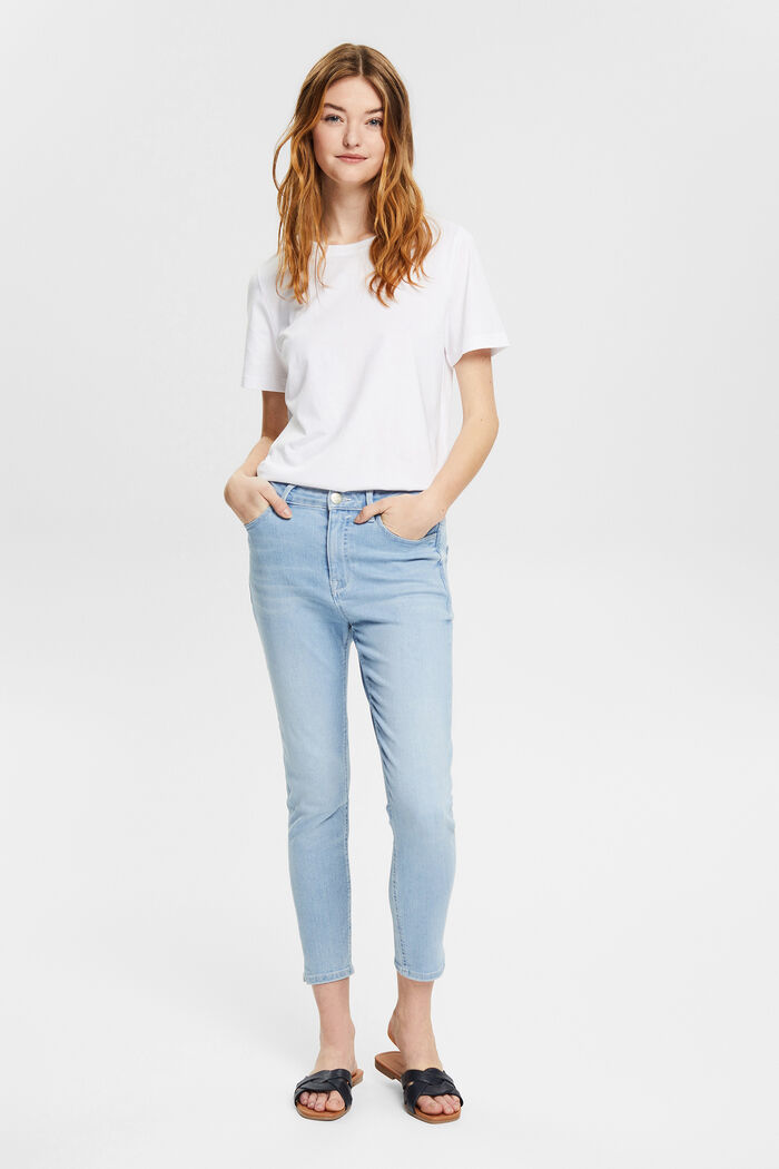 Jeans a vita alta con spacco sul fondo