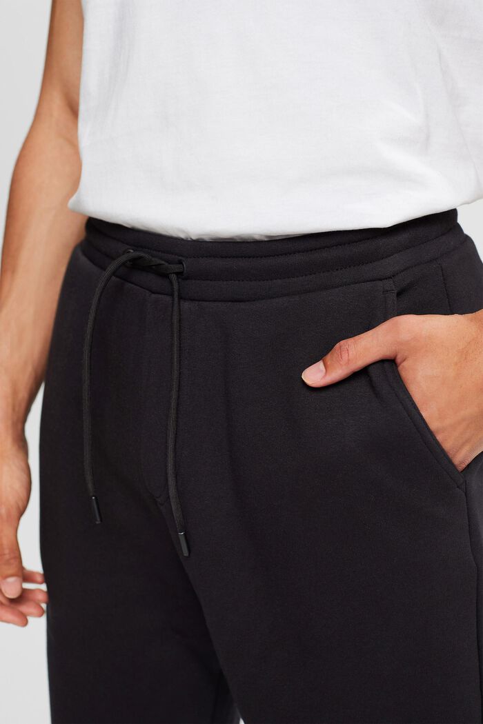 In materiale riciclato: pantaloni felpati con coulisse con cordoncino, BLACK, detail image number 0