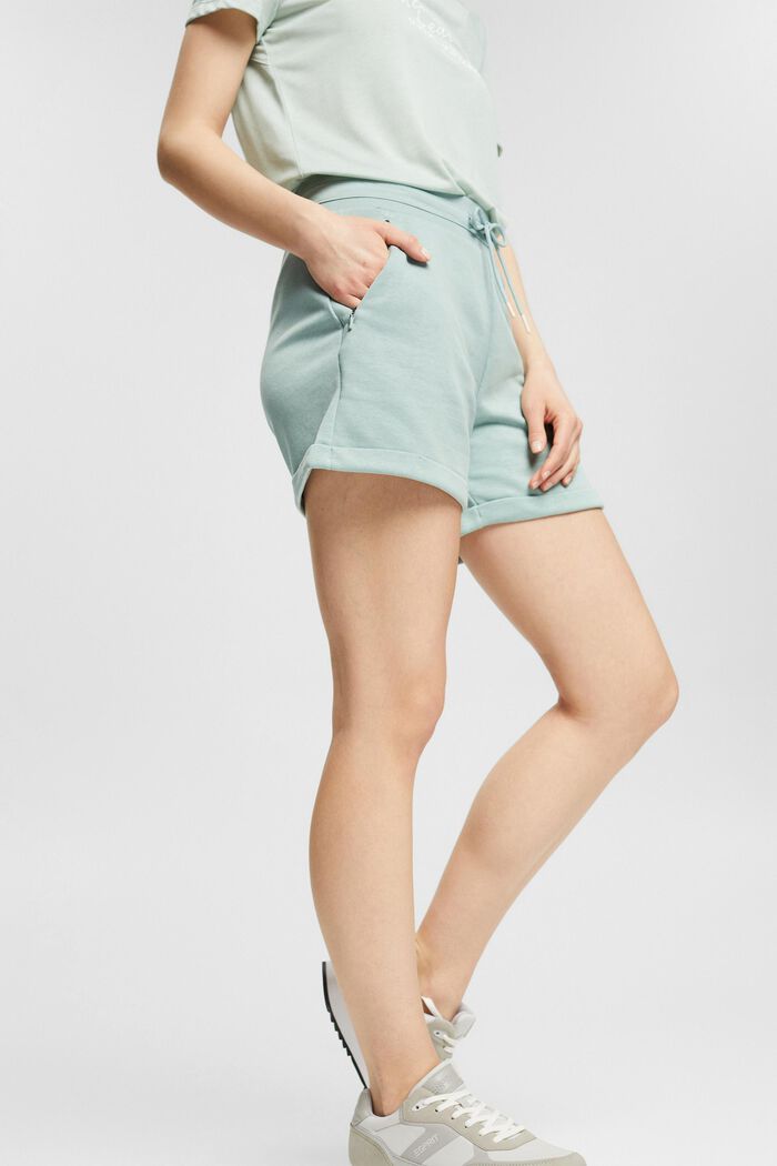 In materiale riciclato: shorts in felpa con tasche con zip